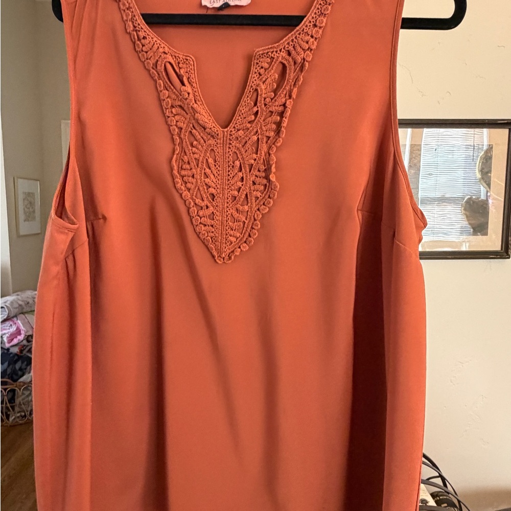 Elegant Sleeveless Top with Lace Accent